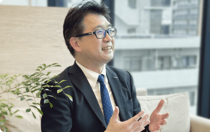 笑顔で語る木村 隆広